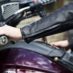 side view of men wearing Men’s Grayson Fox Creek leather motorcycle jacket